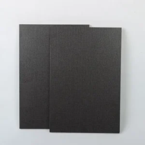 Anti-slip film faced plywood with textured surface for construction and flooring applications.