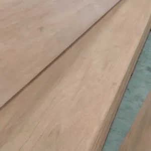 Keruing veneer sheets with natural tropical wood grain for furniture and interior applications.