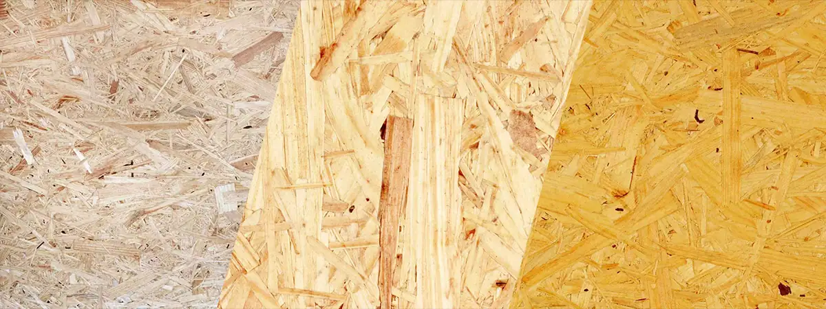 Gros plan sur la texture d'un panneau OSB mettant en évidence le motif unique des fibres de bois superposées.